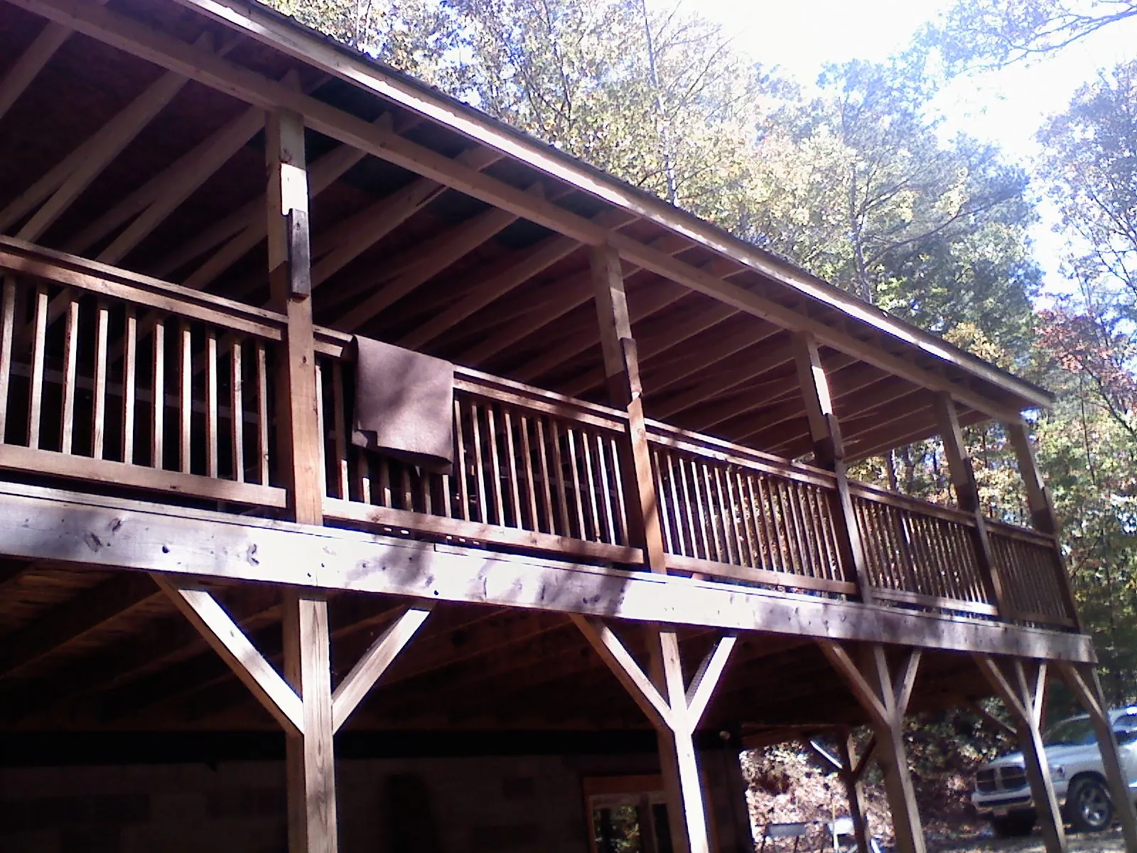 Timber framing under a new elevated porch and deck — Roof Leak Repair in Maidsville by Roofing Brothers